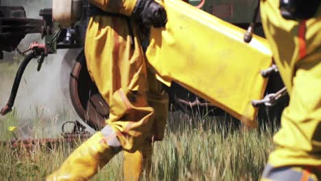 firefighters in hazmat suits responding to a fire or incident