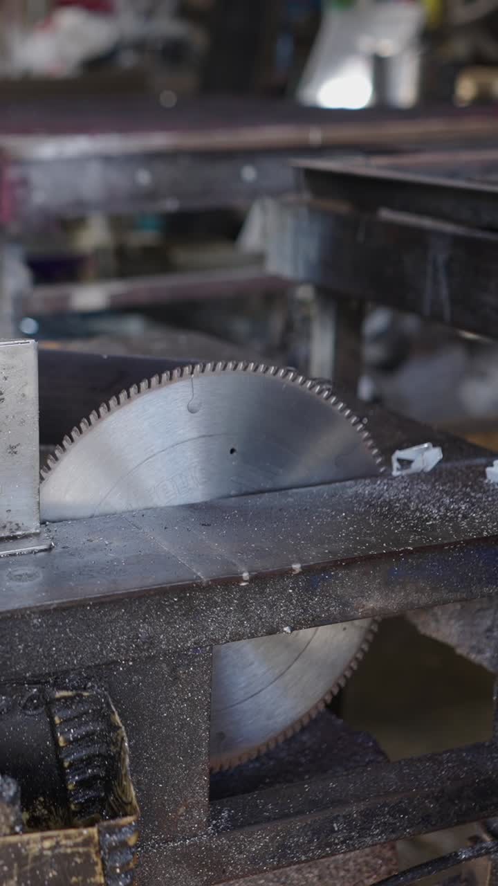 Close-up of a circular saw blade on a table saw