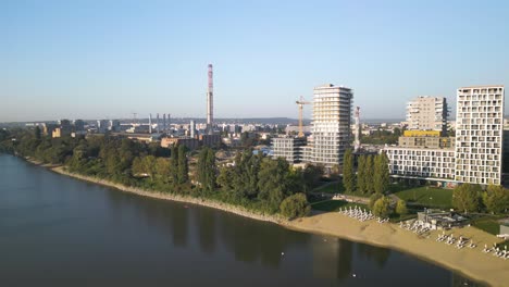 Drone-Flies-Above-Bay-Approaching-MOL-Campus-in-Budapest