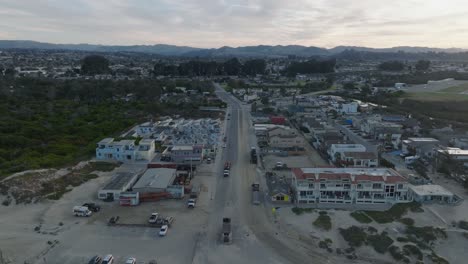 Aerial-Drone-shot-of-Pismo-Beach-California-Airport-and-Town-at-Sunrise
