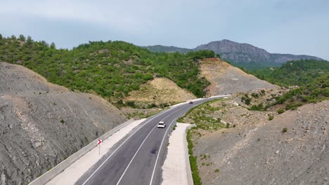 mountain road with cars