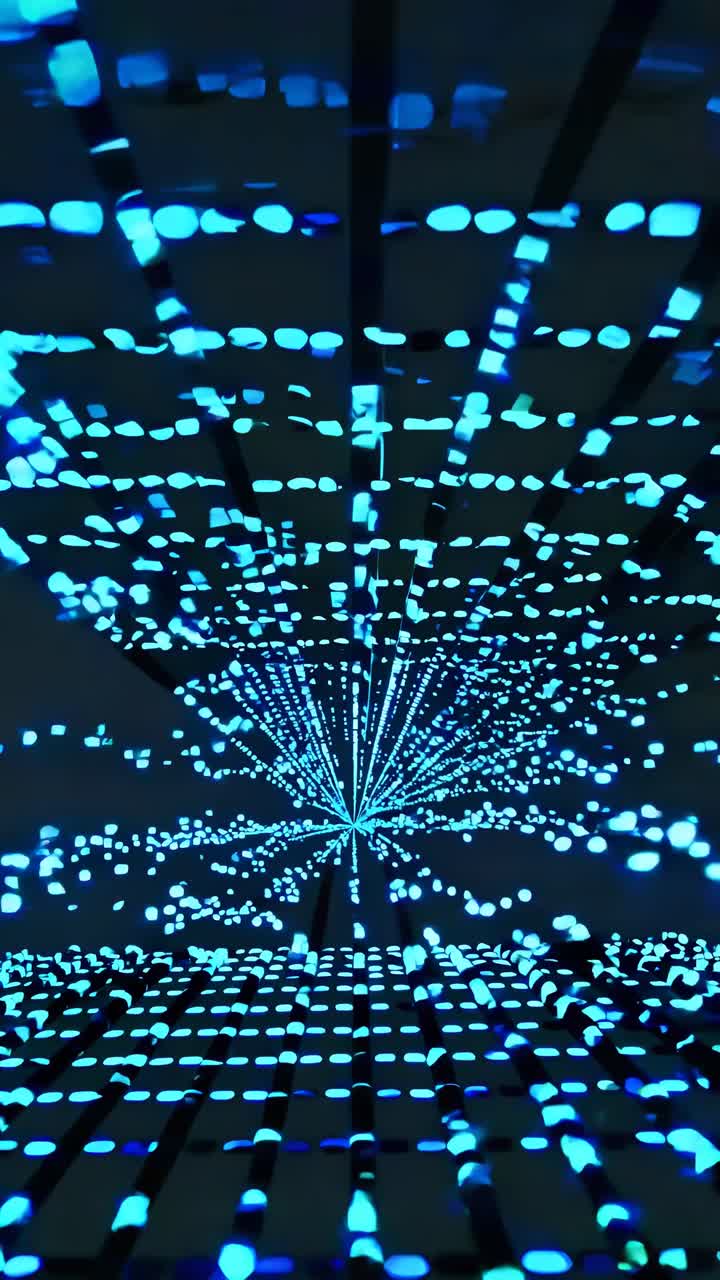 Futuristic video concept with a wormhole effect. Aerial view captures glowing blue dots