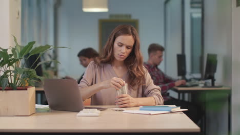 business woman counting cash money. professional worker checking amount of money