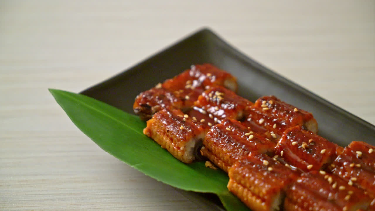 sliced grilled eel or grilled unagi with sauce (Kabayaki) - Japanese food style