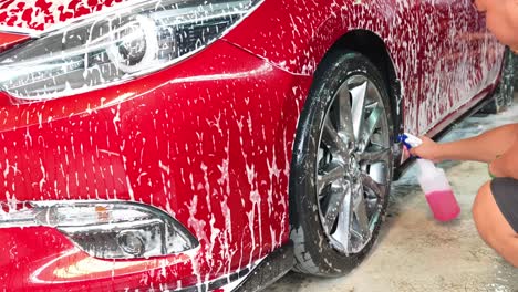 red car getting a wash