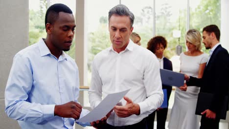 Business-executives-shaking-hands-with-each-other