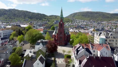 aerial approaching the huge johannes-church in bergen norway - old catholic church made of brick