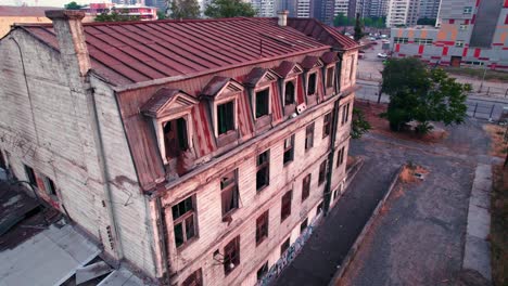 Aerial-view-dolly-in-of-the-abandoned-neonatology-area-of-the-Barros-Luco-Hospital,-decay-and-misery-Santiago-Chile