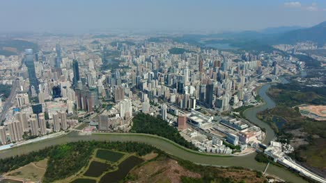 aerial view over shenzhen skyline on a beautiful clear day