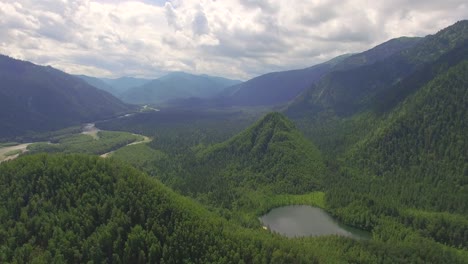 aerial photography. heavenly landscape of the landscape with a mountain lake in siberia near lake baikal. warm lake of the snezhnaya river. vydrino