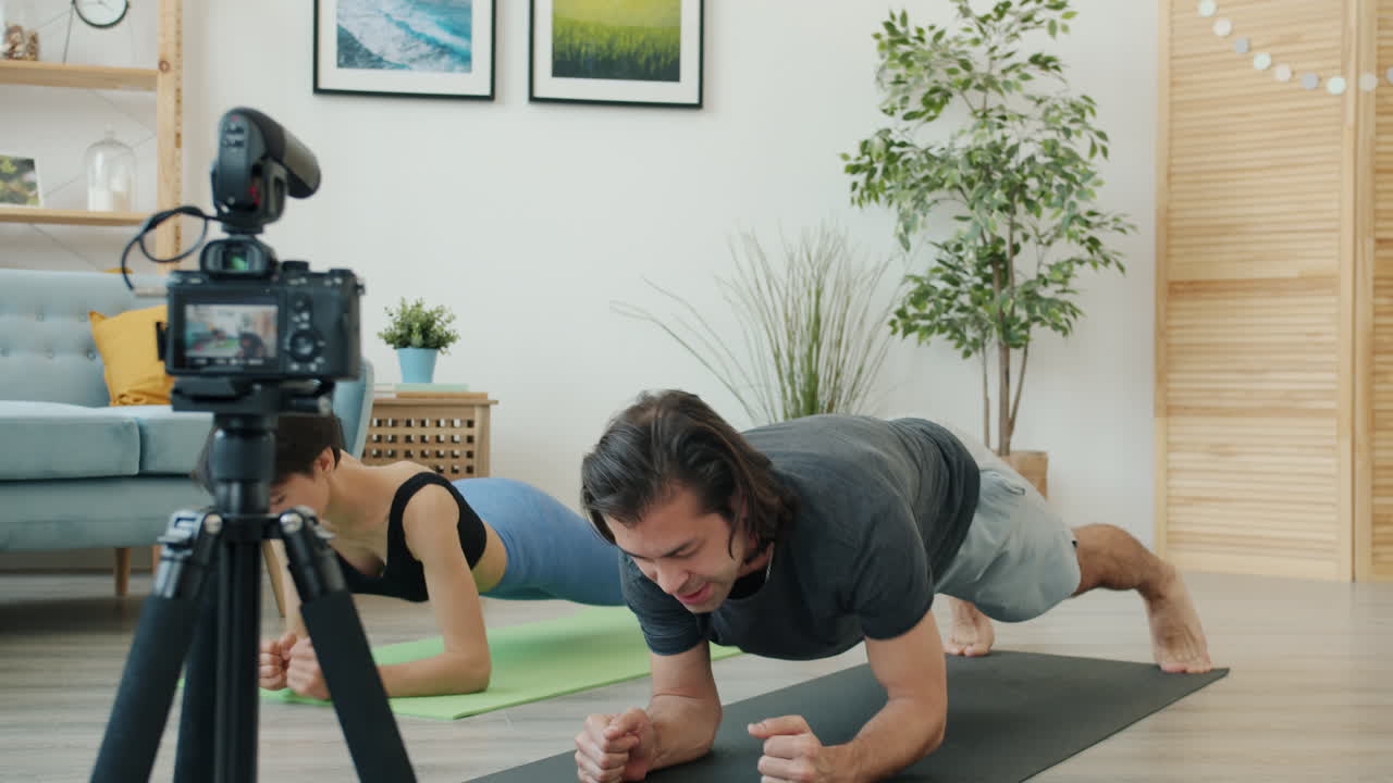Couple Doing Plank Exercise at Home