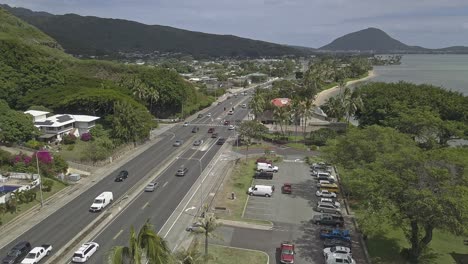 scenic hawaiian highway with traffic and tow truck