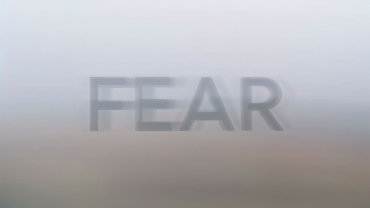 Shifting frames sharpening centered word FEAR becoming clearer on blurred backdrop soft shadow