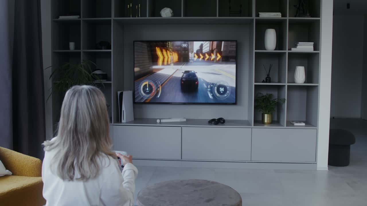 Woman playing car racing video game