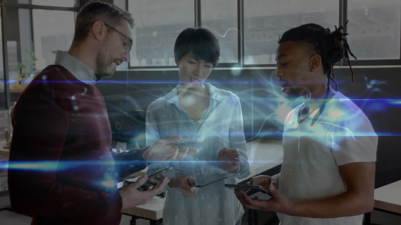 Animation of light trails over diverse business people in office