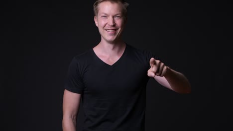 happy man showing copy space with hands