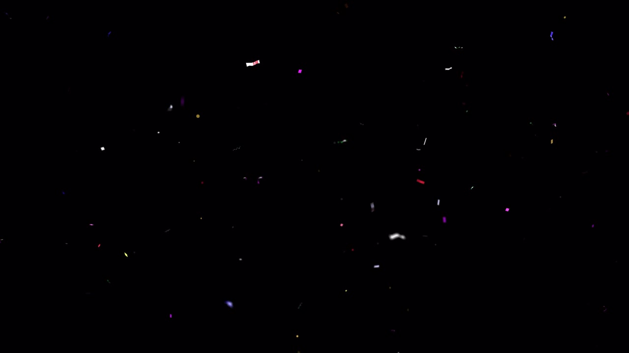 Coriandoli colorati che cadono ed esplodono su sfondo nero