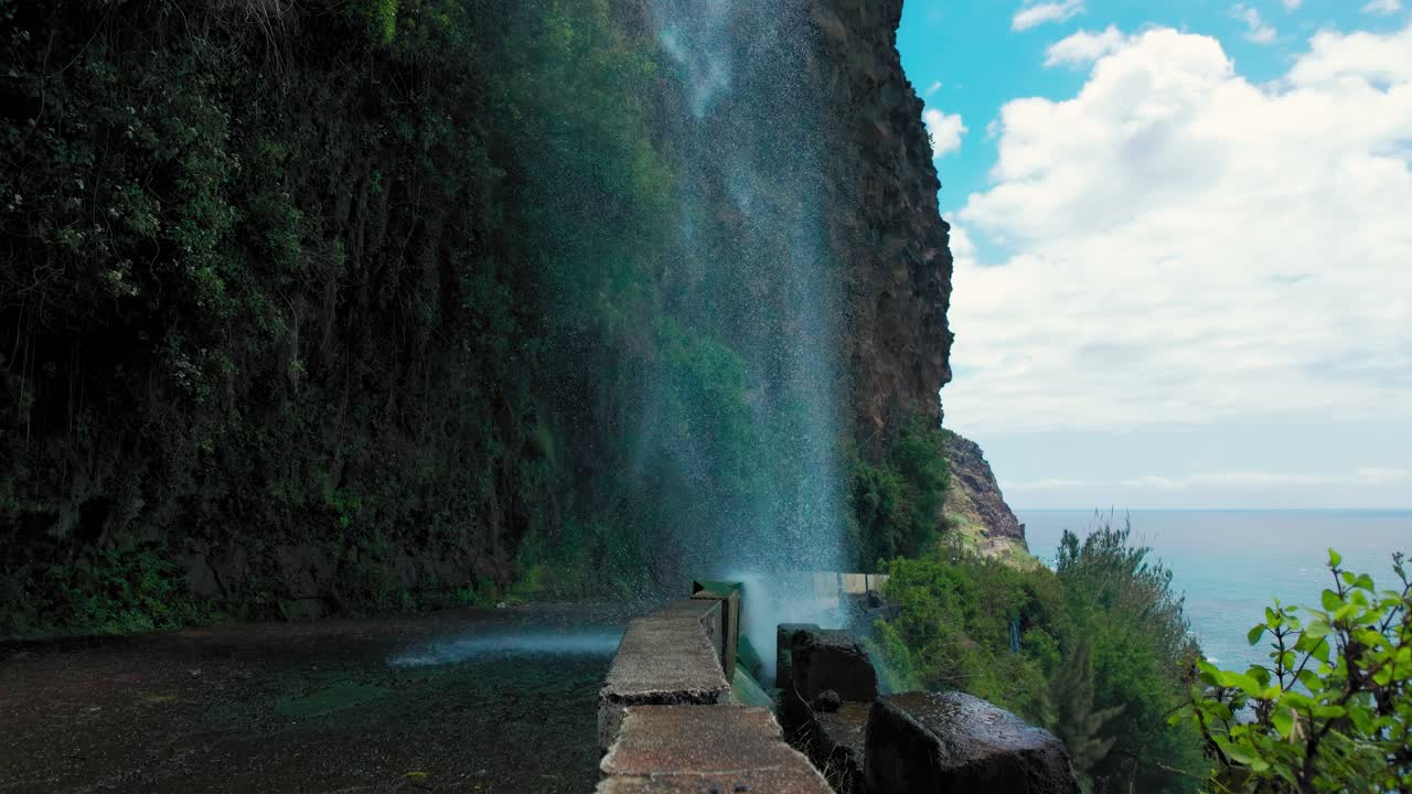 Cascada dos Anjos, waterfall on a road in Madeira island, Portugal