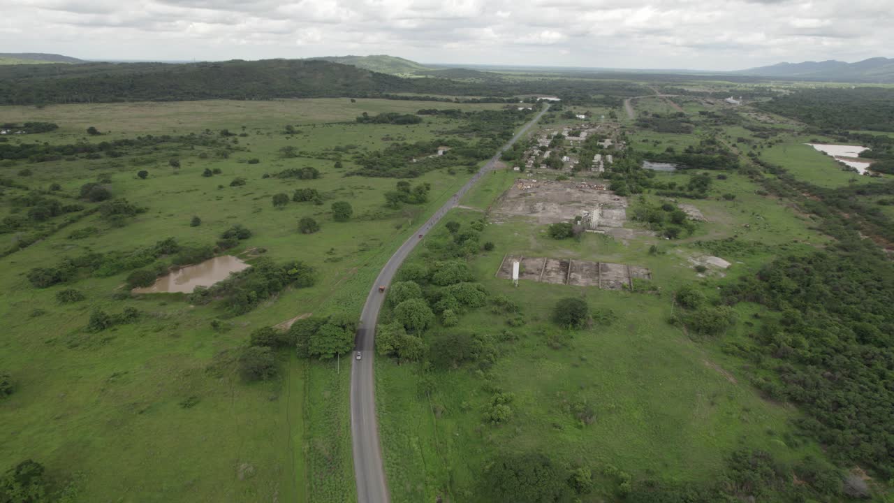 Aerial view of Rio Verde, road among green tropical wetlands, Guárico, Venezuela