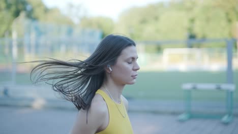 woman running on a track