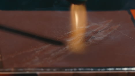 close up of match striking and lighting on matchbox in extreme slow motion, 4k 800fps macro close up of match flame