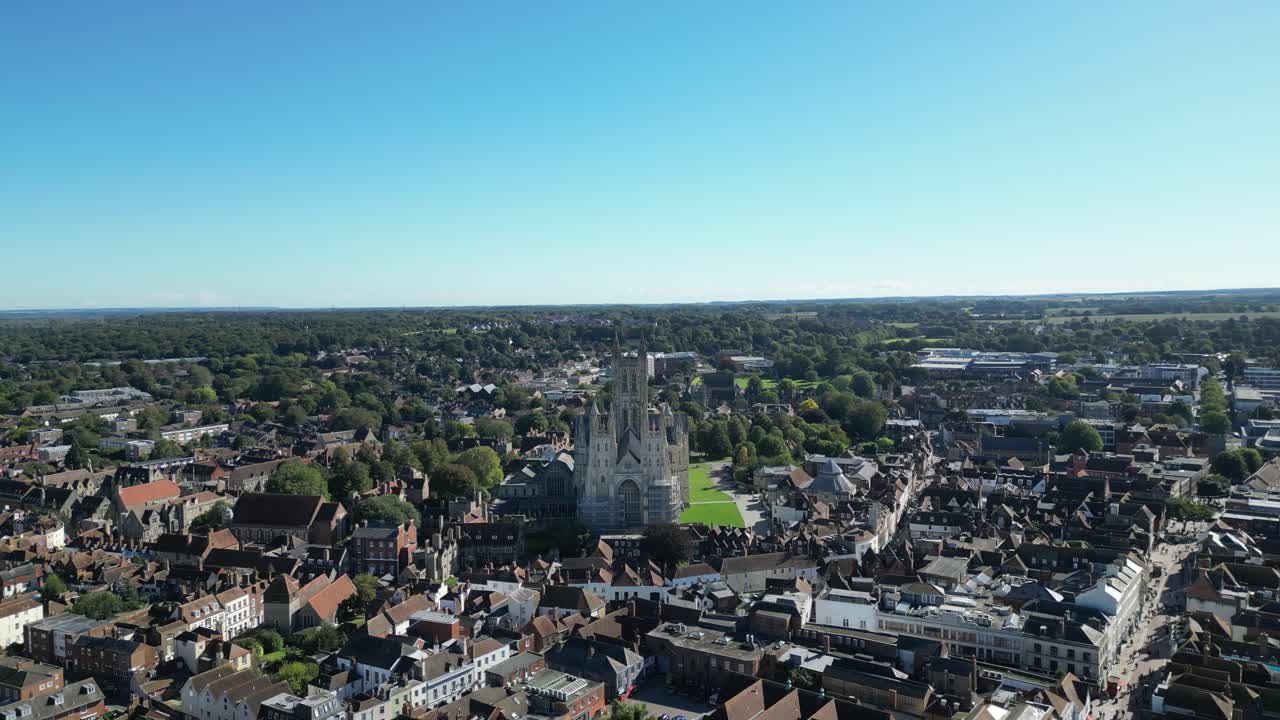 Smooth panning aerial movement around the Canterbury cathedral and its environment, Kent, England.
