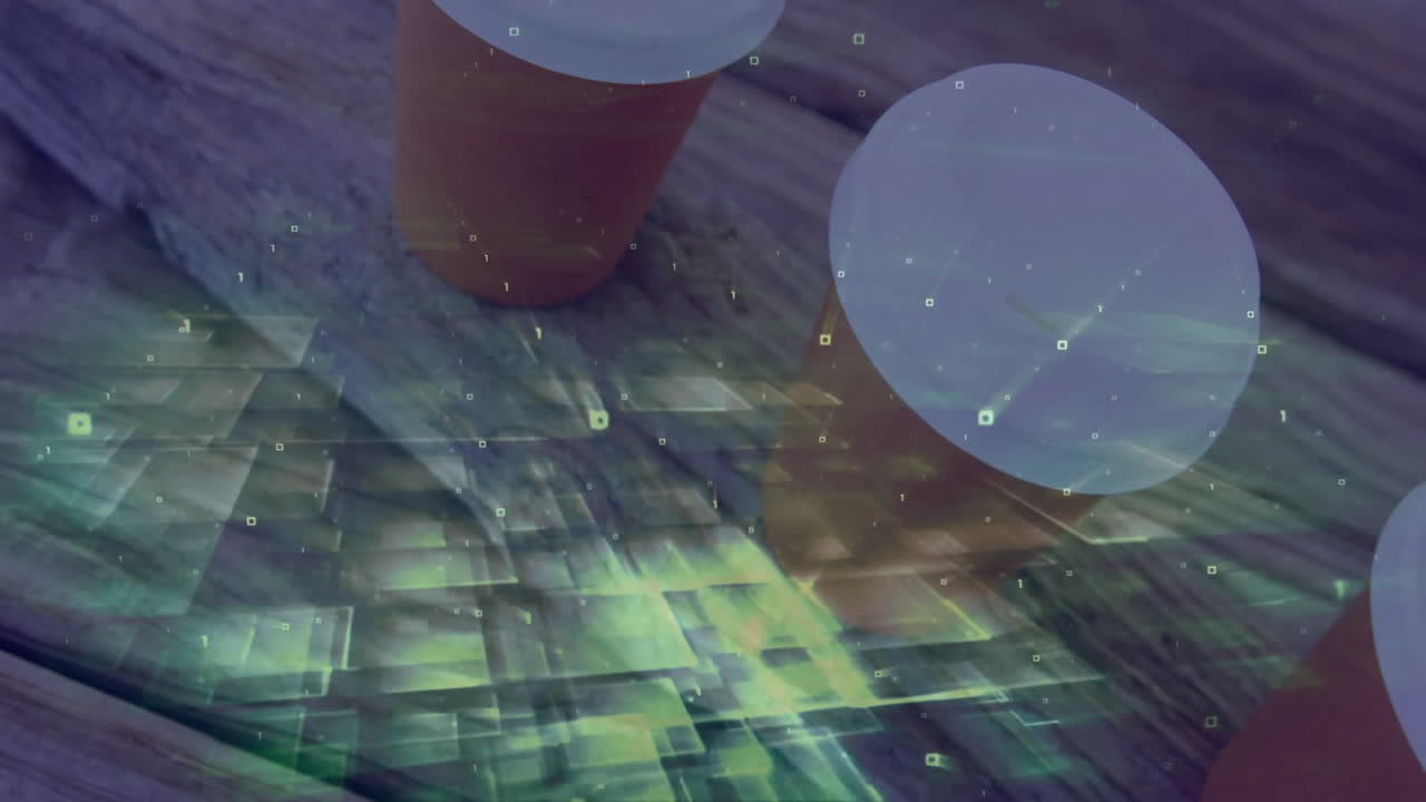 Two orange cups being visualized on wooden deck, with green augmented reality overlay, binary code