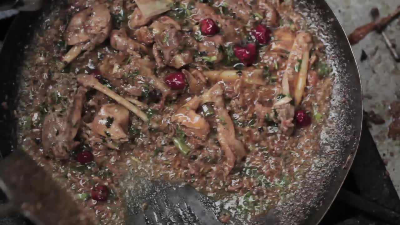 Cooking Chicken with Cranberries and Spices