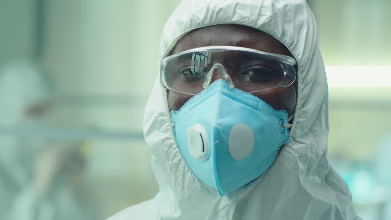 Portrait of African American Scientist in Protective Uniform