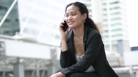 businesswoman on phone call in city