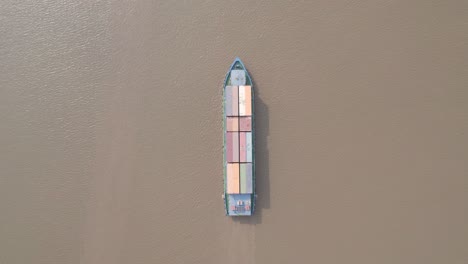 topdown view of a logistic transport container ship on the river