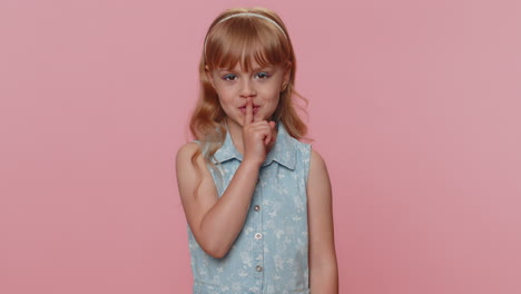Preteen-child-girl-presses-finger-to-lips-makes-silence-hush-sign-do-not-tells-gossip-secret,-quiet