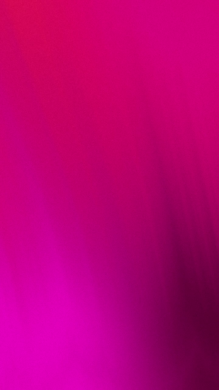 Fondo abstracto degradado en fucsia y magenta con grano