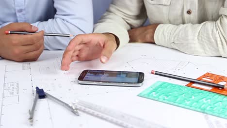 Mans-Hands-Drawing-Lines-Paper-At-Modern-Office