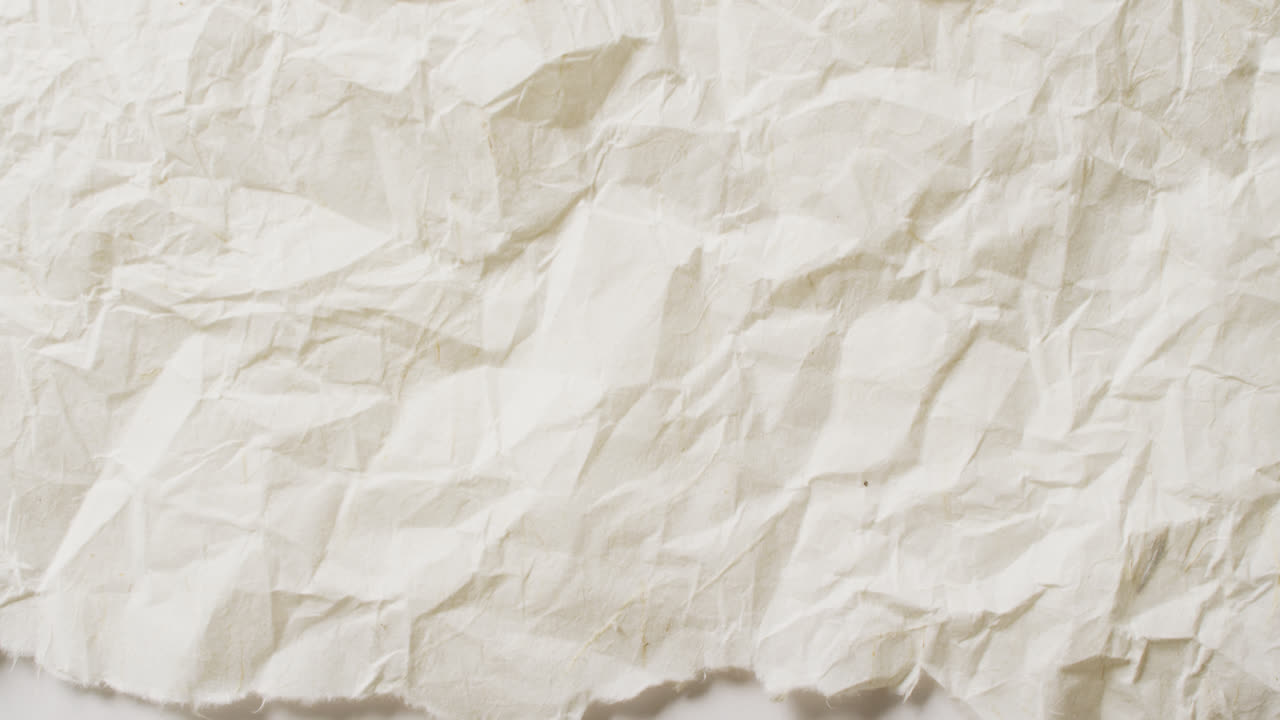 Premium stock video - Video of close up of crumpled white paper texture ...