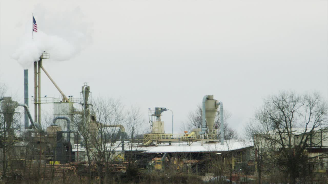 Pollution Engulfs American Flag Smoke Stack Factory