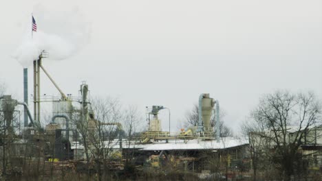 pollution engulfs american flag smoke stack factory