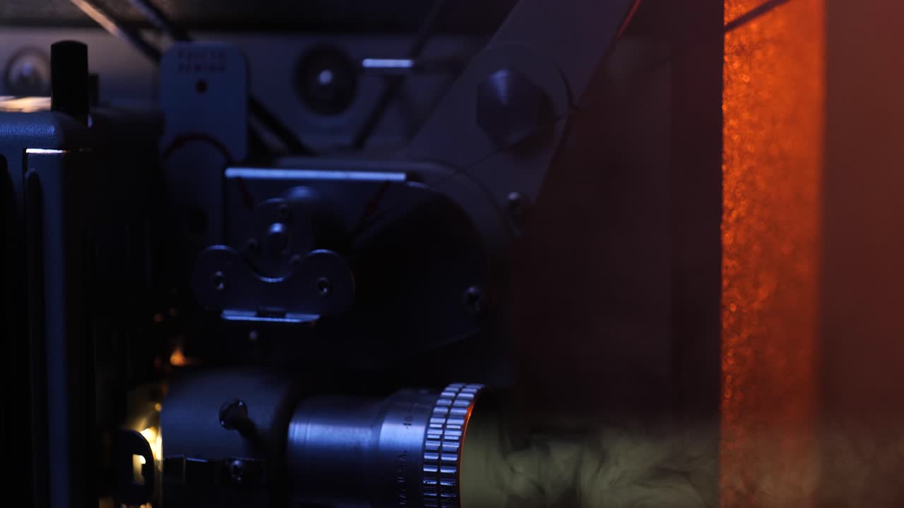 16mm movie projector crane shots in a smokey room