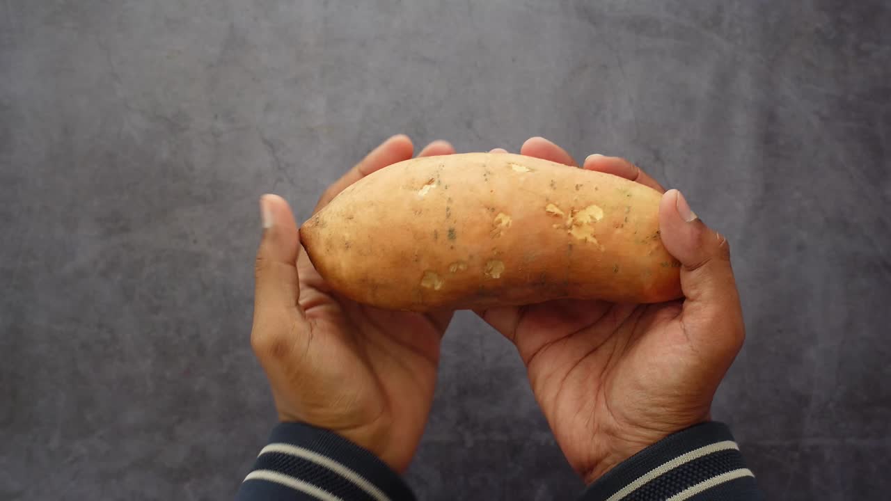 Holding a Sweet Potato