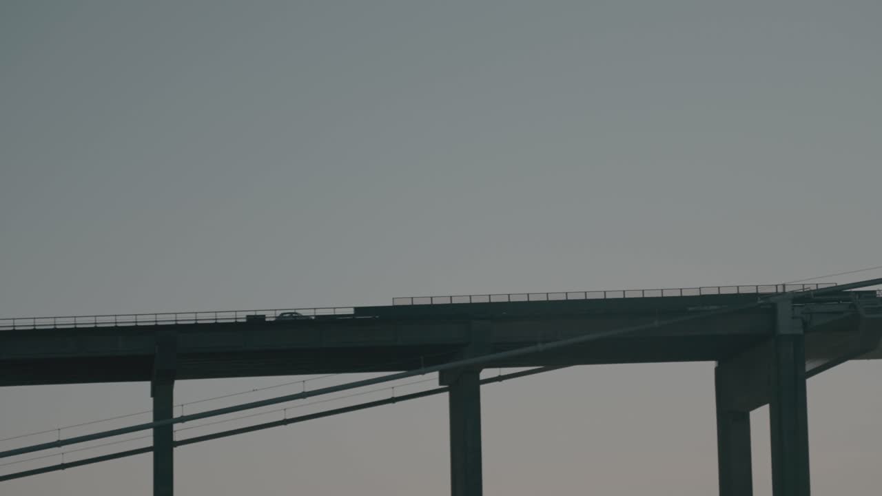 Car driving over bridge in Middelfart, Denmark