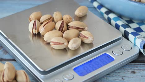 weighing pistachios