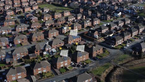 Solar-panel-graphic-overlay-flashing-over-British-neighbourhood-properties-using-the-technology-aerial-view