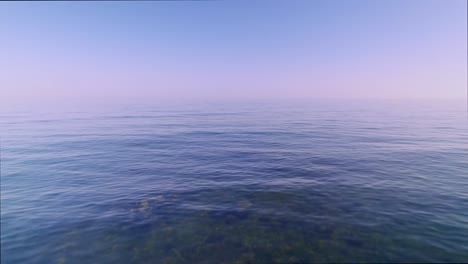 ocean waves on the mediterranean sea, aerial moving backwards into the beach