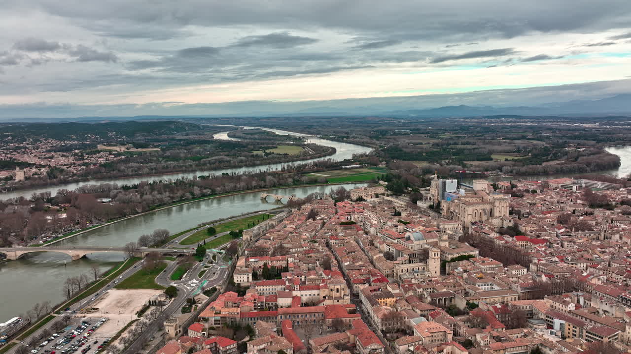 Aerial view of Avignon under a dramatic cloudy canopy.