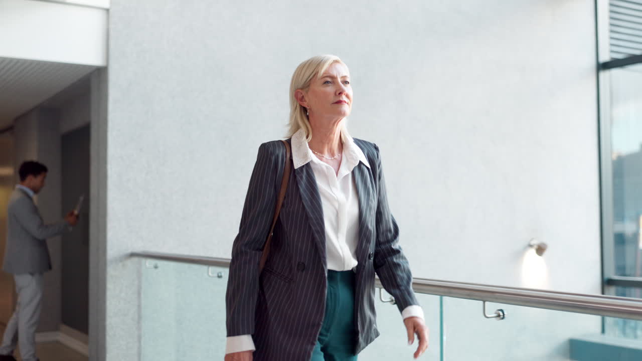 Businesswoman Walking in Modern Office