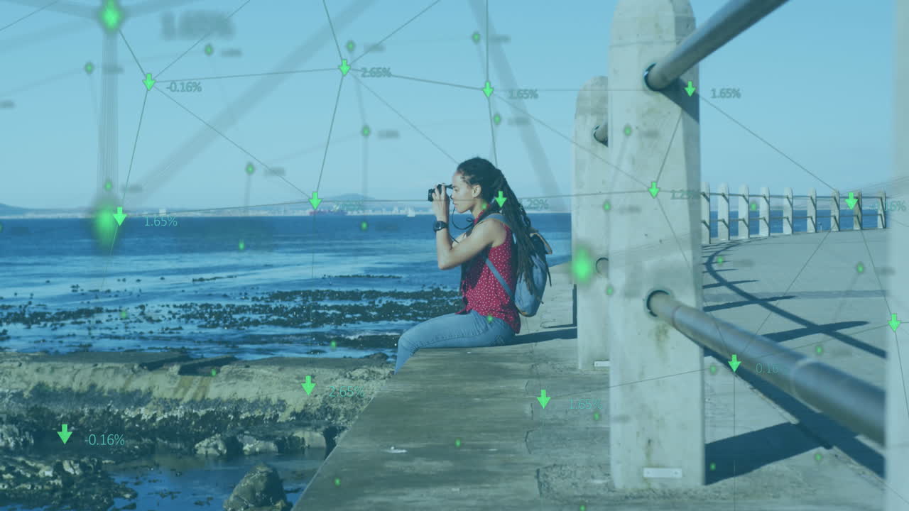 아프리카계 미국인 여성이 디지털 카메라를 사용하여 사진을 찍는 것을 반대하는 연결 네트워크