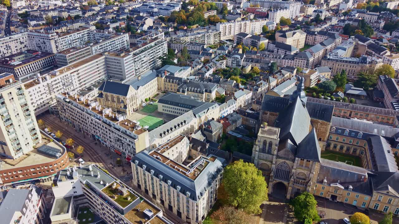 Aerial view of Le Mans cityscape, France, featuring Préfecture de la Sarthe administrative classic building adjoining Saint-Julien Cathedral surrounded by residential and commercial urban blocks