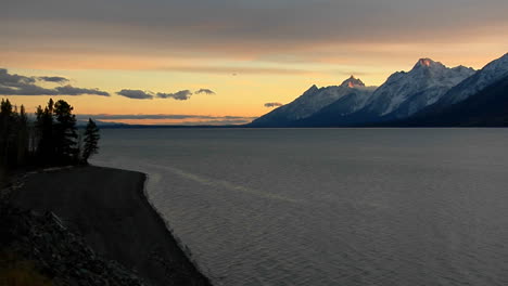 The-Grand-Teton-Mountains-Stand-At-The-End-Of-A-Majestic-Lake