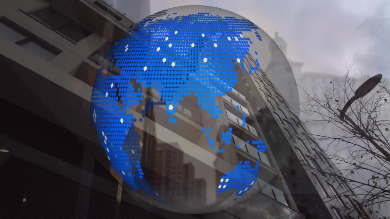 Animation of globe spinning over cityscape