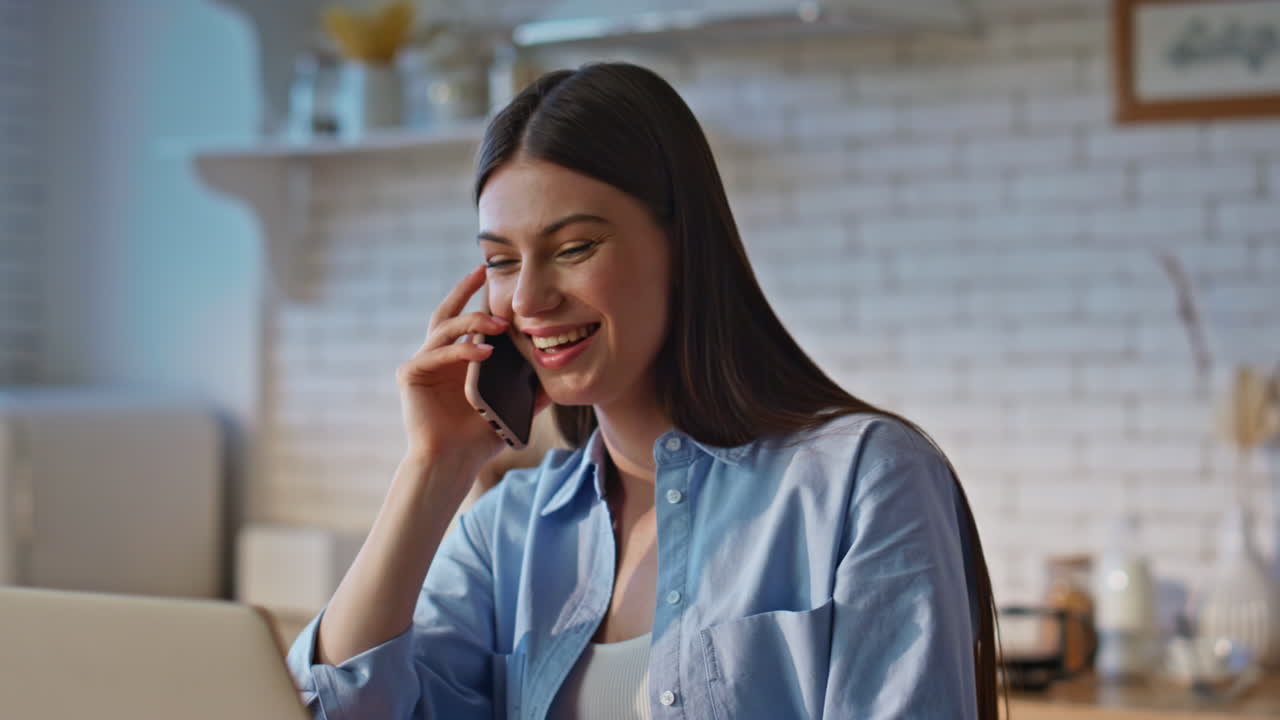 Busy lady working computer at cozy kitchen workplace closeup. Girl typing laptop